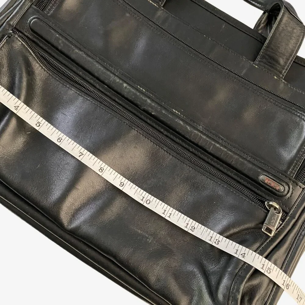 TUMI Black Leather Laptop Briefcase with Multiple Compartments